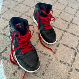The Nike Air Jordan 1 Retro High OG boy size 4